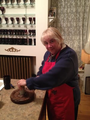 Tina cooking brownies for guests