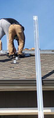 Installation crew showing their a** on the roof