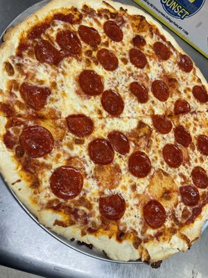 Pepperoni pizza by the slice