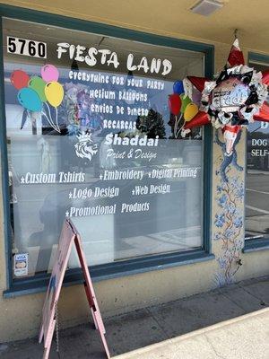 Fiesta Land storefront with services offered