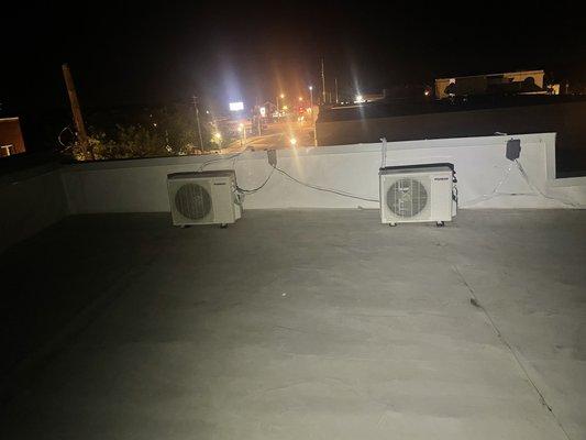 HVAC MINI-split units installed on downtown rooftop.