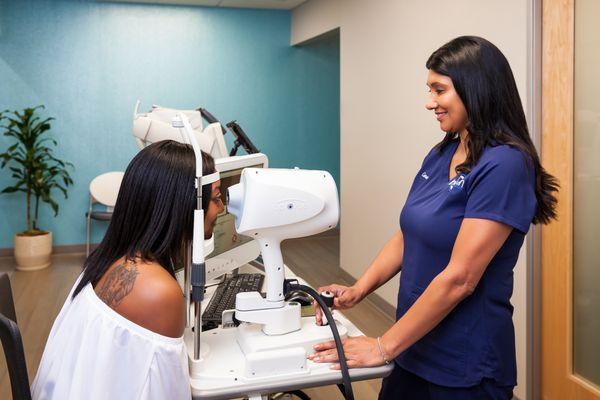 Diagnostic testing during an eye exam at Invision Optometry.