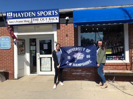 The storefront with our UNH Flag!