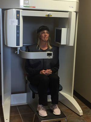 Our hygienist Tammy demonstrating the new iCAT 3D imaging machine.  The latest in dental radiology technology.