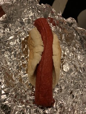 Asked for hot dog all the way. This is what I got!! A hot dog in a damn hamburger bun. Cooks wearing no mask! Also None of my condiments!!