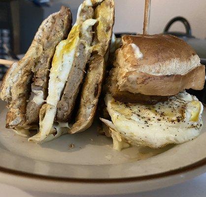 Sausage egg and cheese on cinnamon toast bagel