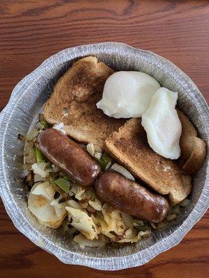 2 poached eggs, sausage, wheat toast, and home fries with pepper and onion.