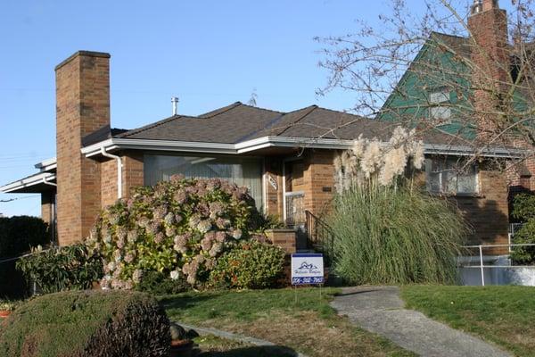 The Tile roof was replaced with architectural grade composition shingles picture framed with the high profile ridge caps - wo...