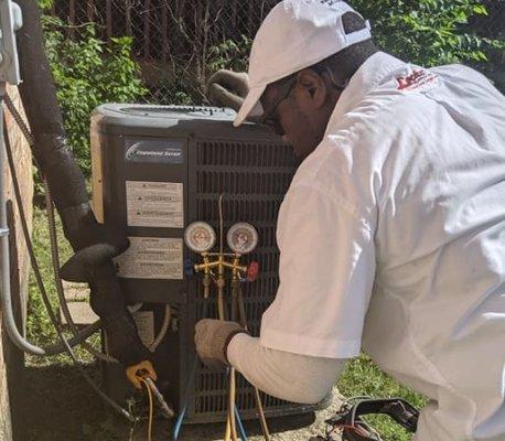 Forrest checks refrigerant levels