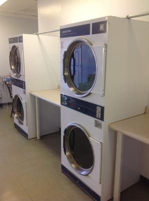 Dryers with folding tables