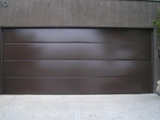 Flush smooth brown steel door