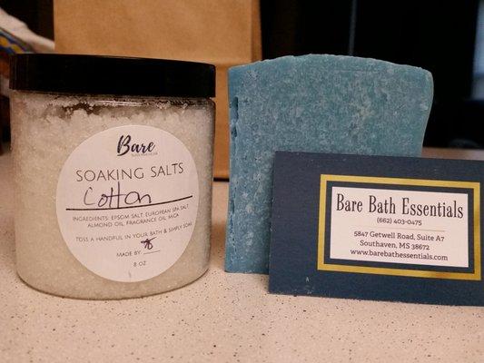 Cotton scent soap bar and bath salts.