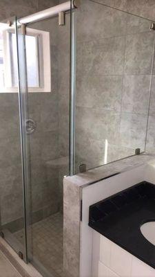 Rolling shower door