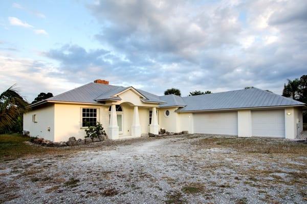 This incredible "Old Florida" style home is for sale. 4 bedrooms, 3 1/2 baths, 3 car garage on 1 Acre. Additional 1 acre lot next door too.