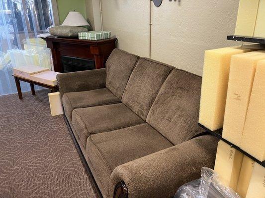 They even have a nice (vintage?) waiting area couch while your foam is being cut to order behind the invisible curtain.