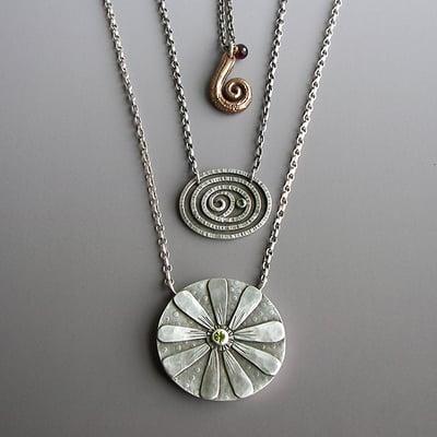 Handcrafted jewelry by Holly Gonnella. I am part of the Lithia Artisans Market of Ashland Oregon, weekends along the creek.