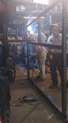 James and Nathan Ellis welding on a custom gate