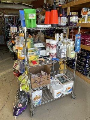 Wormers, supplements, scoops, and grooming supplies