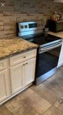 Stove top and kitchen after being cleaned