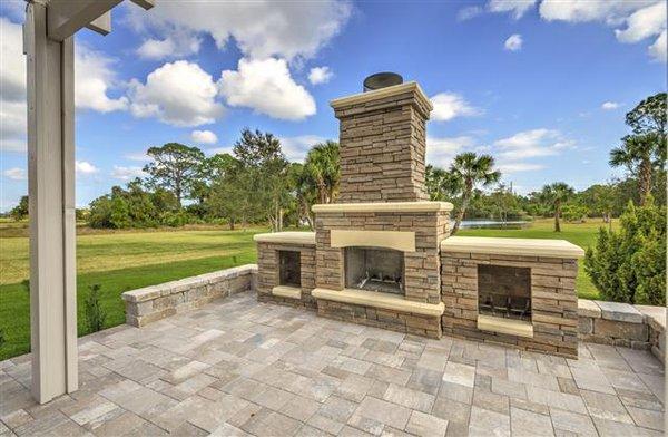 Outdoor fireplace at our model 3557 Province Drive Melbourne, Fl. 32934 Call 321-724-6674