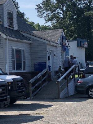 Service dog and disabled elder, my mother in law, were denied entry to the business. Had to sit on the steps for 2 hours in the heat.