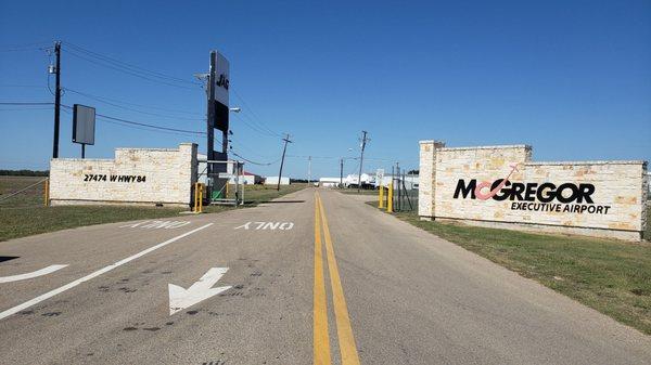 Entry to airport just off of Hwy 84, west side of highway.