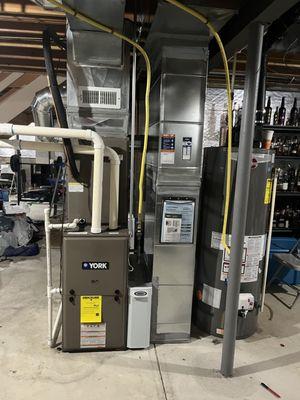 Residential furnace and a/c replacement project. Complete with a new larger return air drop , humidifier and air filter media