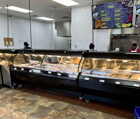 All the meats and sides on the hot bar.