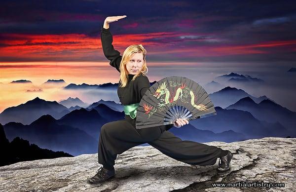 Strength and beauty of movement go hand in hand in kung fu - with training, an iron fan can be a powerful weapon.