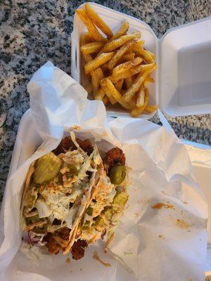 Tacos (chicken style: hot) and seasoned fries