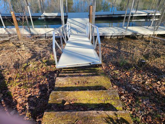 This is the result of Austin refusing to clear a large fallen tree before slamming in the dock. Plus not keeping his word on the pile.