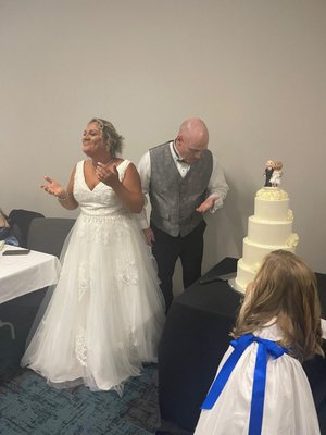 This was after she got hit with the wedding cake. Yanis got all the best pictures.