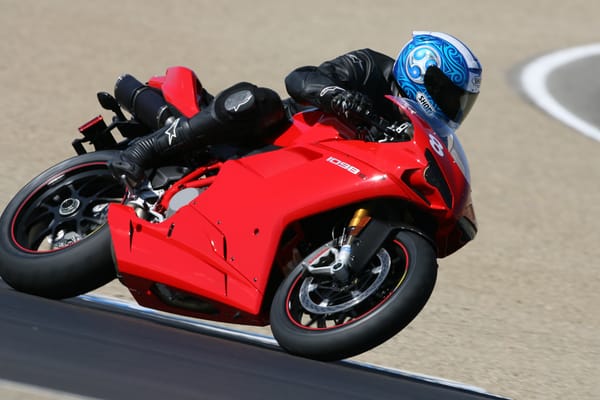 Steve shredding asphalt at Laguna Seca