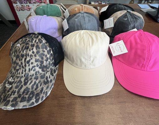 Women's criss cross back ponytail hats