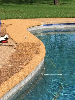 Installing the Rubaroc around the pool! How exciting!