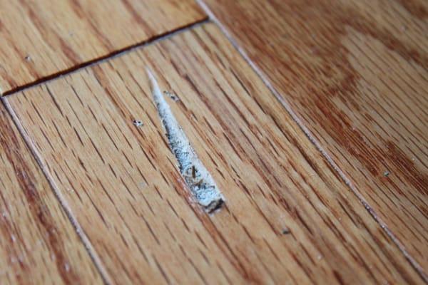 Damage caused by Fairway Installer to new hardwood floors