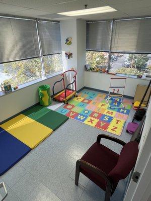 Our Pediatric room featuring our mini treadmill!