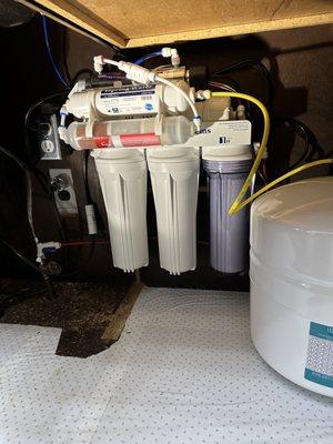 Installation of a water filtration system.