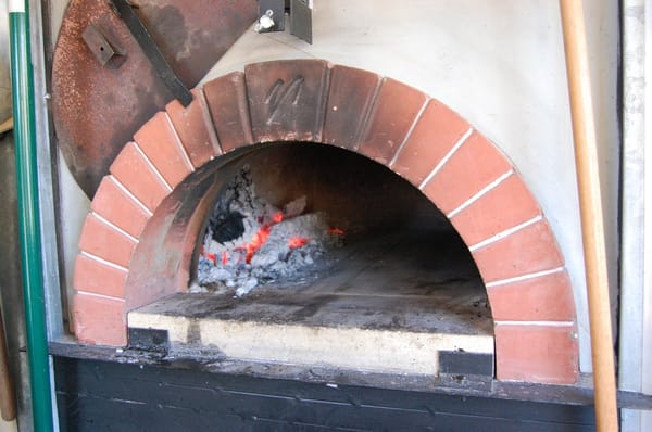 The wood fired oven inside the food truck