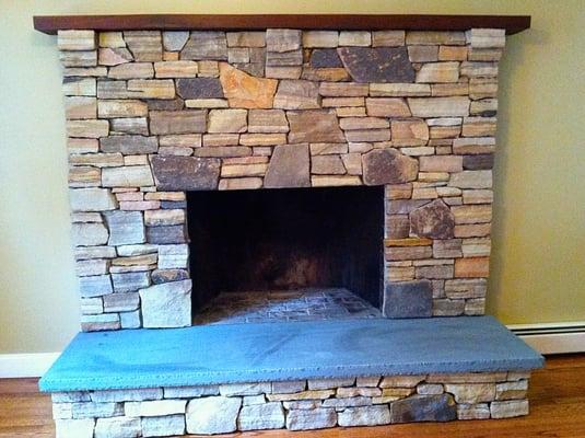 Fireplace New Hampton NY.  Fireplace built with real stone veneer.  Mountain ledge fieldstone.