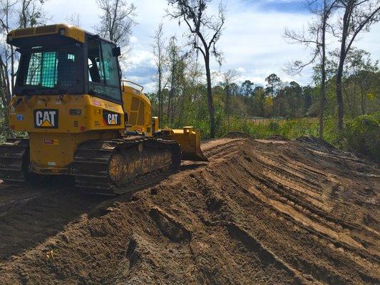 Land grading for a pond