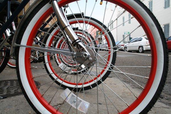 You'll know our bicycles by their red rims.