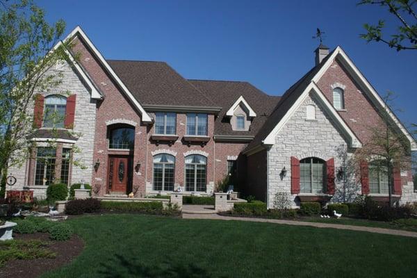 Exterior Wood Shutters and Window Planters Designed, Crafted, & Installed by Custom Architectural Design. 708-533-1174