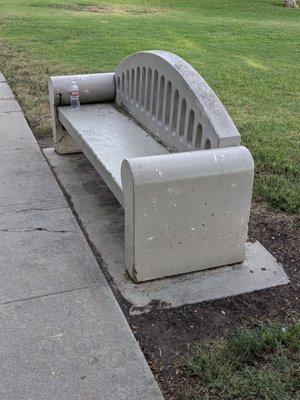 Bench in the park. No, that's not my water bottle