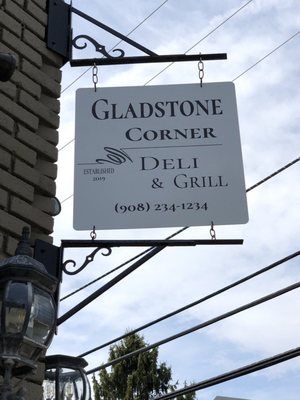 Gladstone Corner Deli & Grill sign