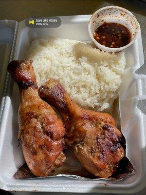 Lao bbq chicken with sticky rice and spicy soy sauce dipping.