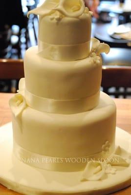 Calla Lily Wedding Cake - A picture is worth a thousand words-this elegant ivory cake is perfect for any time of day.