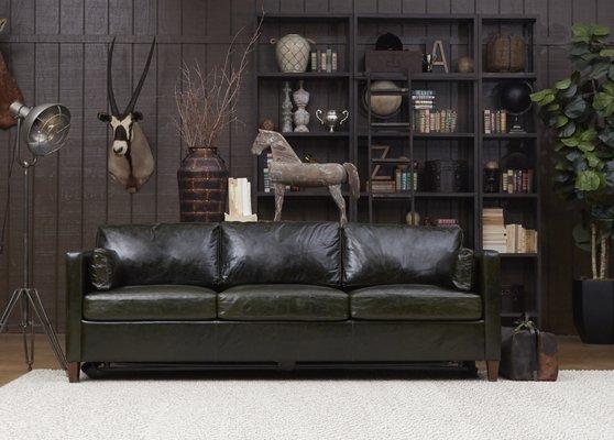 This sleek sofa is available in both Leather or Fabric with blend down seats and backs.