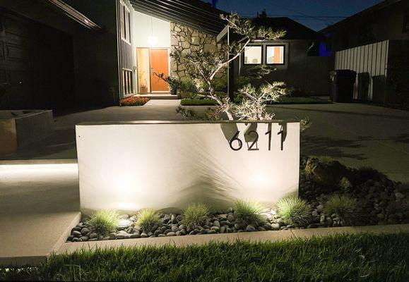 Smooth stucco accent wall with lights