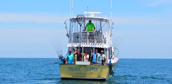 Happy customers holding up a few of the walleye caught!